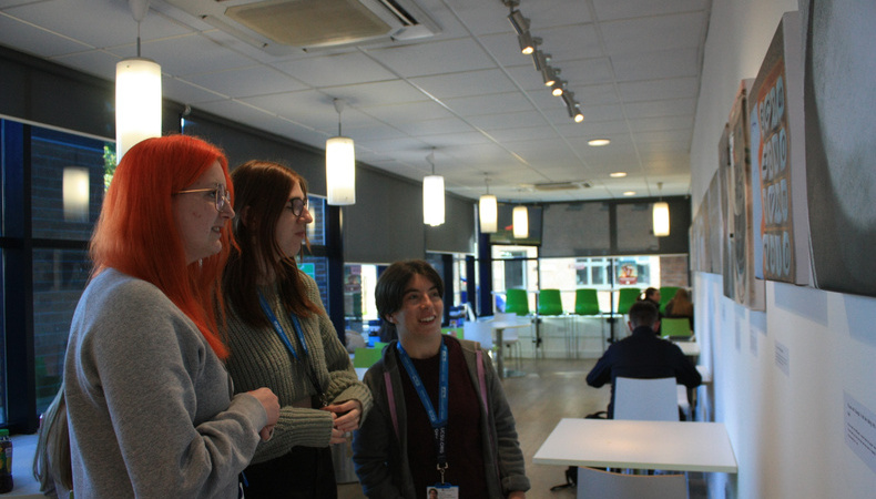 D245-students-discussing-the-exhibition-1666778837.jpg