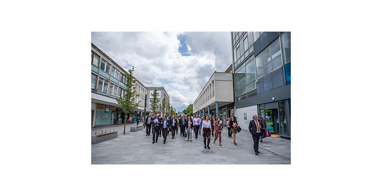 people_walking_through_town_centre_750